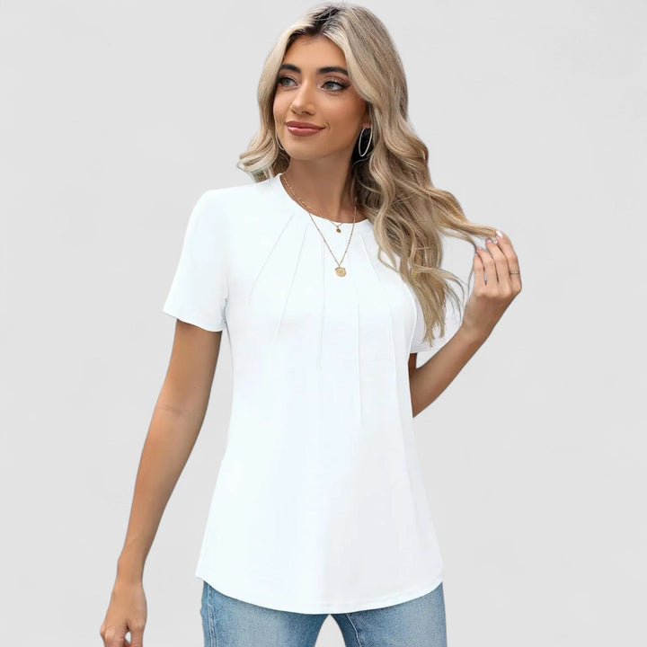 Ninna-Stockholm  | Noelie – Kortärmad topp med sömdetaljer